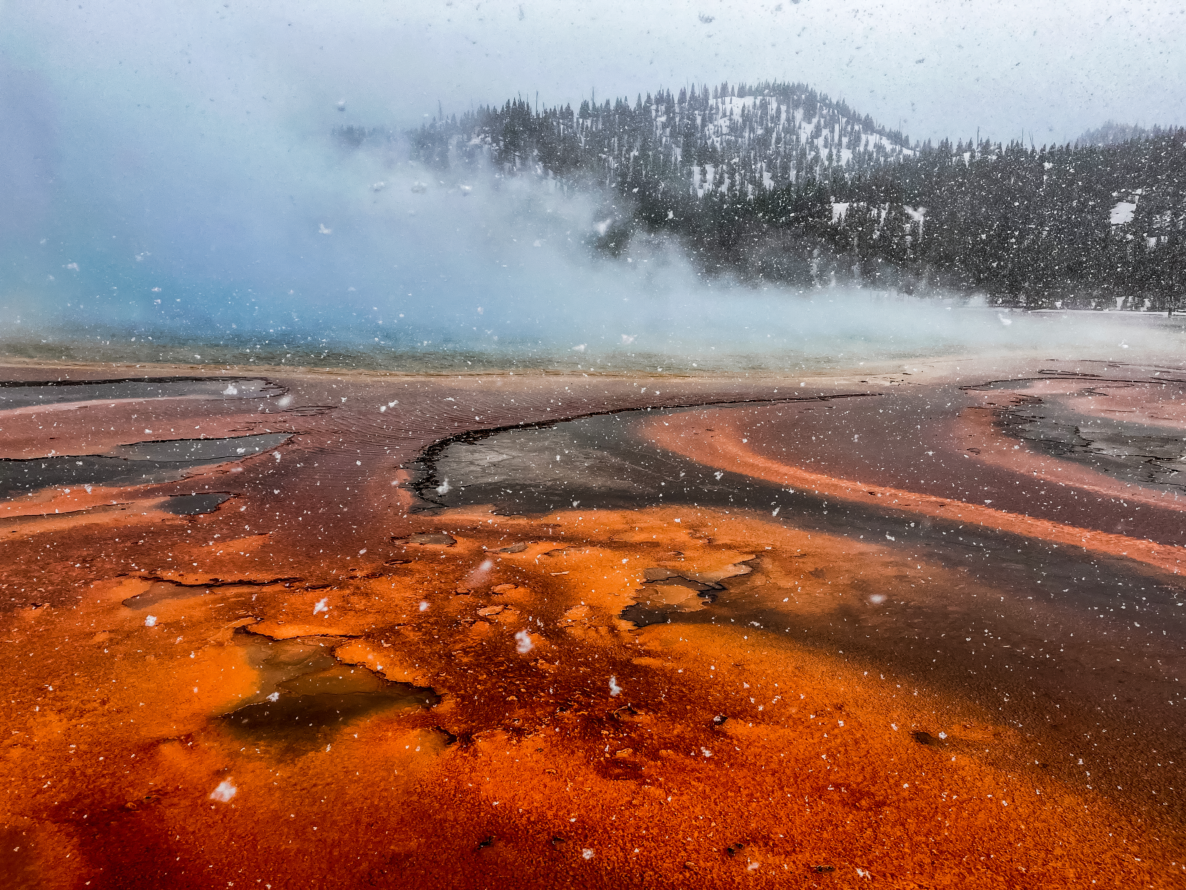 Snowing at Grand Prismatic Spring Yellowstone National Park by Paul Kestel