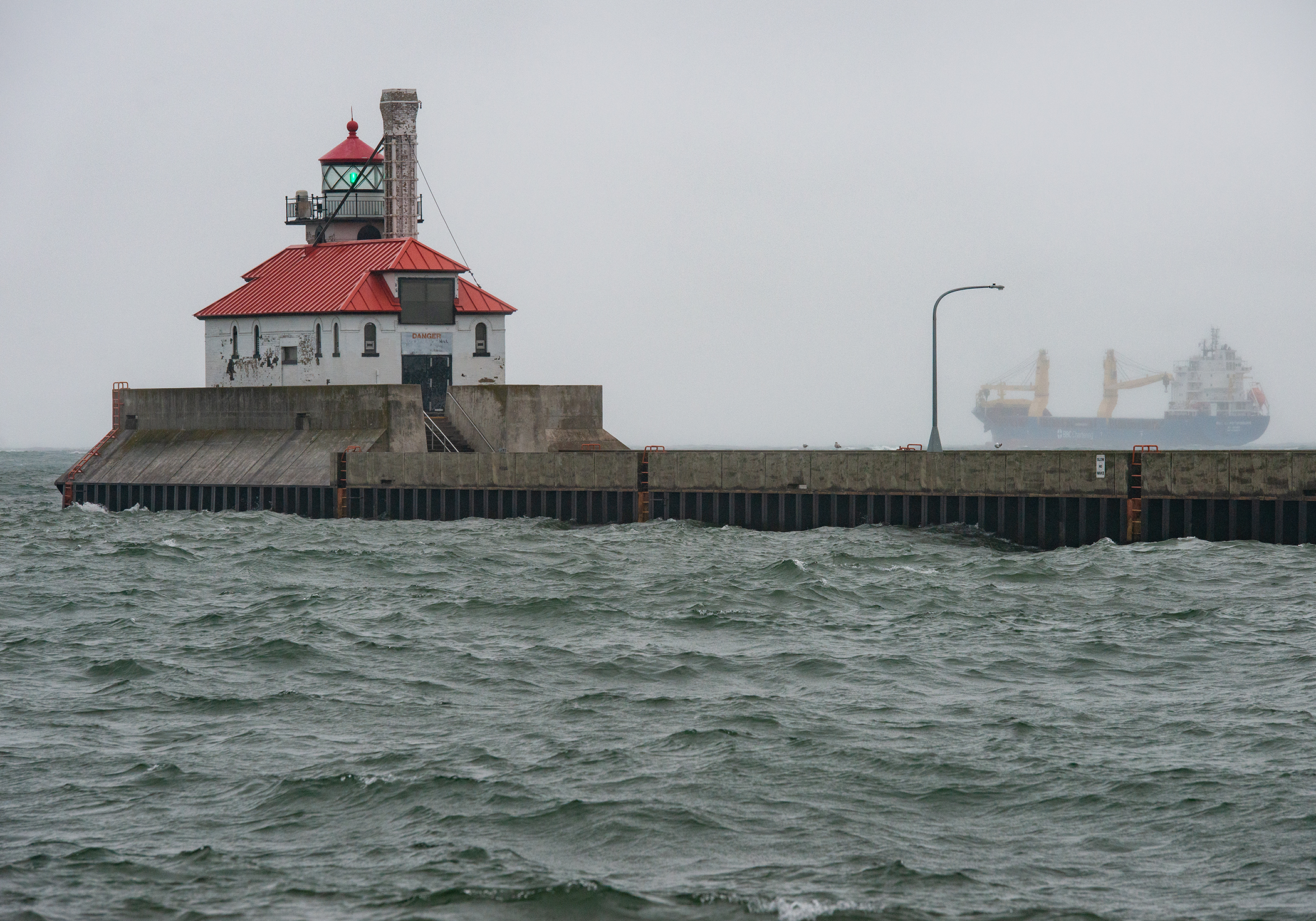 Duluth Lighthouse with Ship by Paul Kestel
