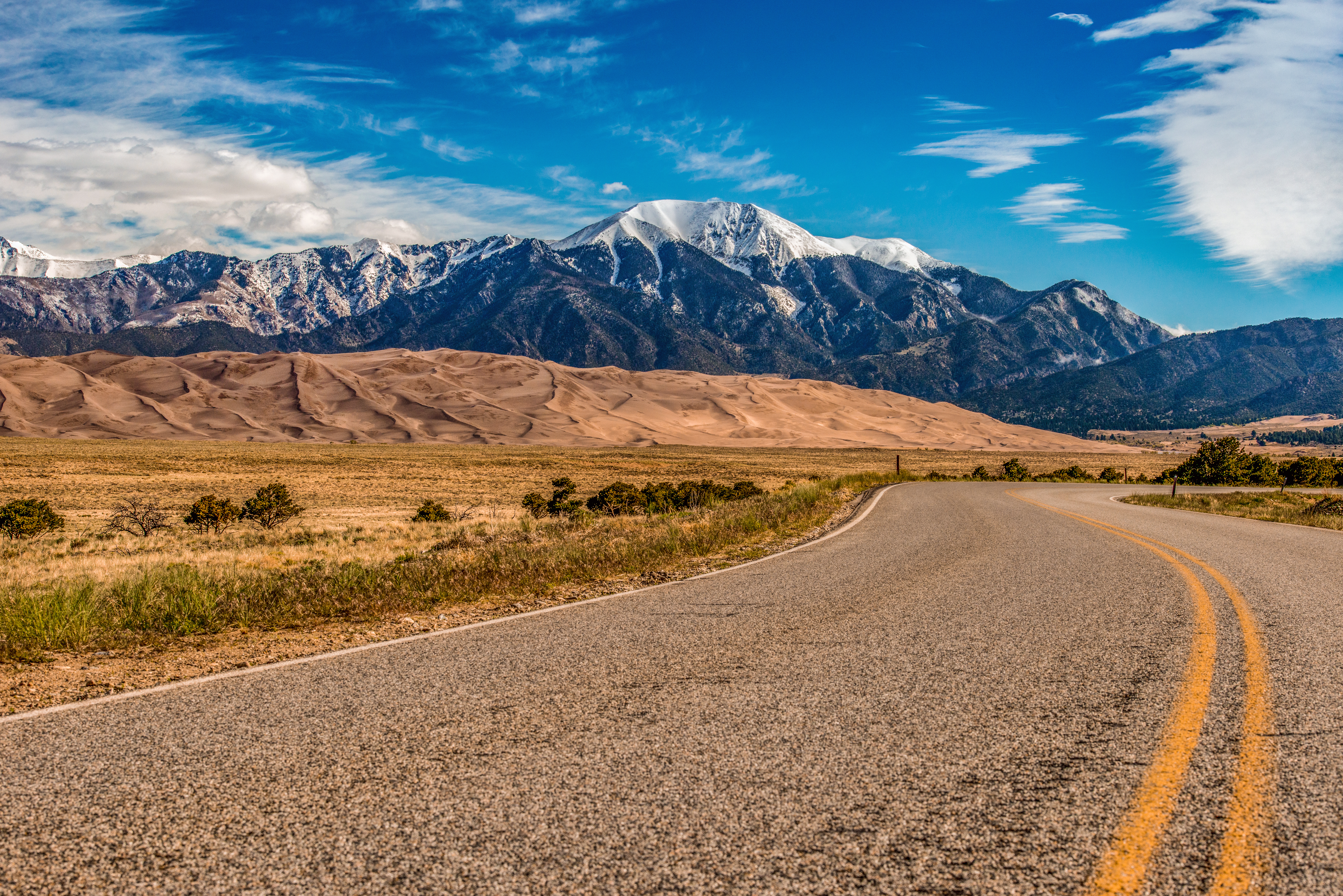 Winding Road to Great Sand Dunes National Park by Paul Kestel